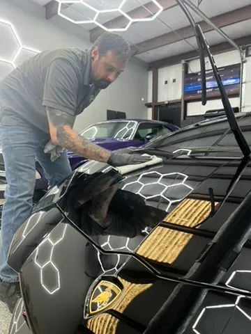 Polishing a black hood