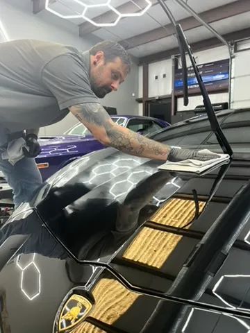 Correcting a black hood